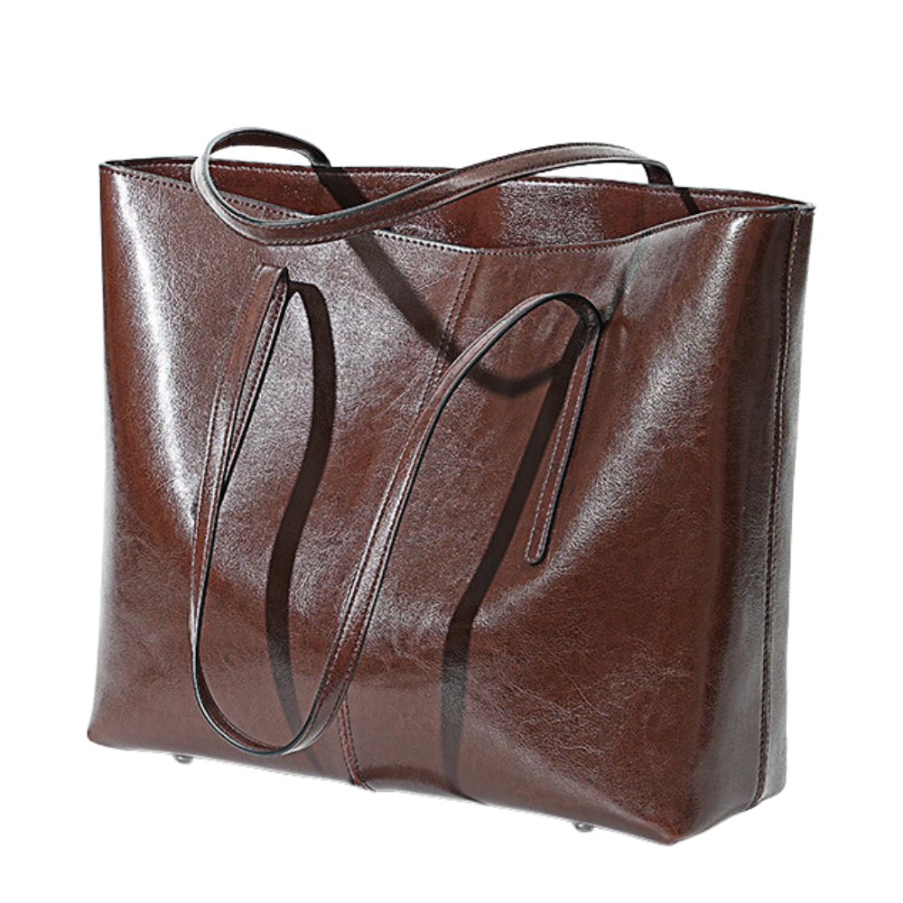 Brown leather tote bag on a white background
