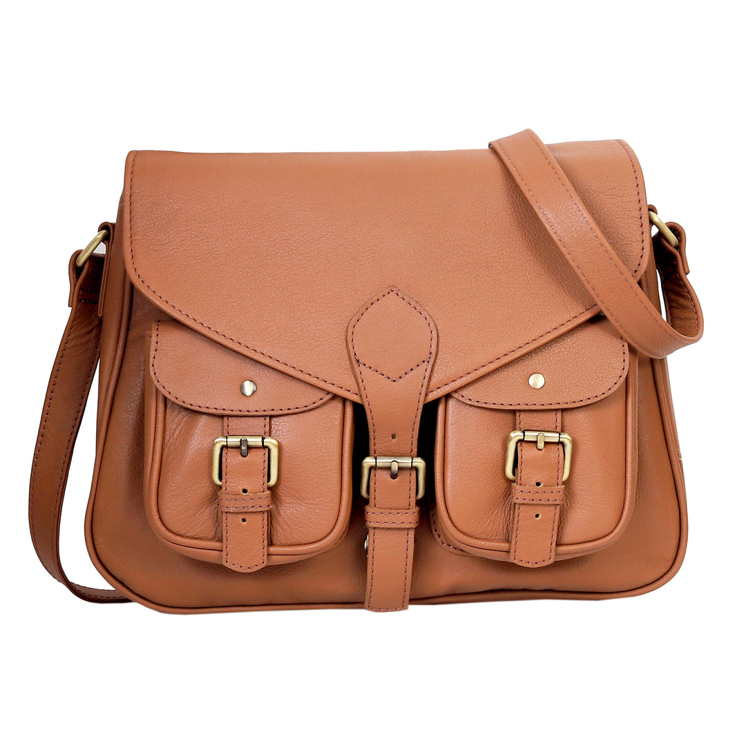 Brown leather satchel bag with gold buckles on a white background