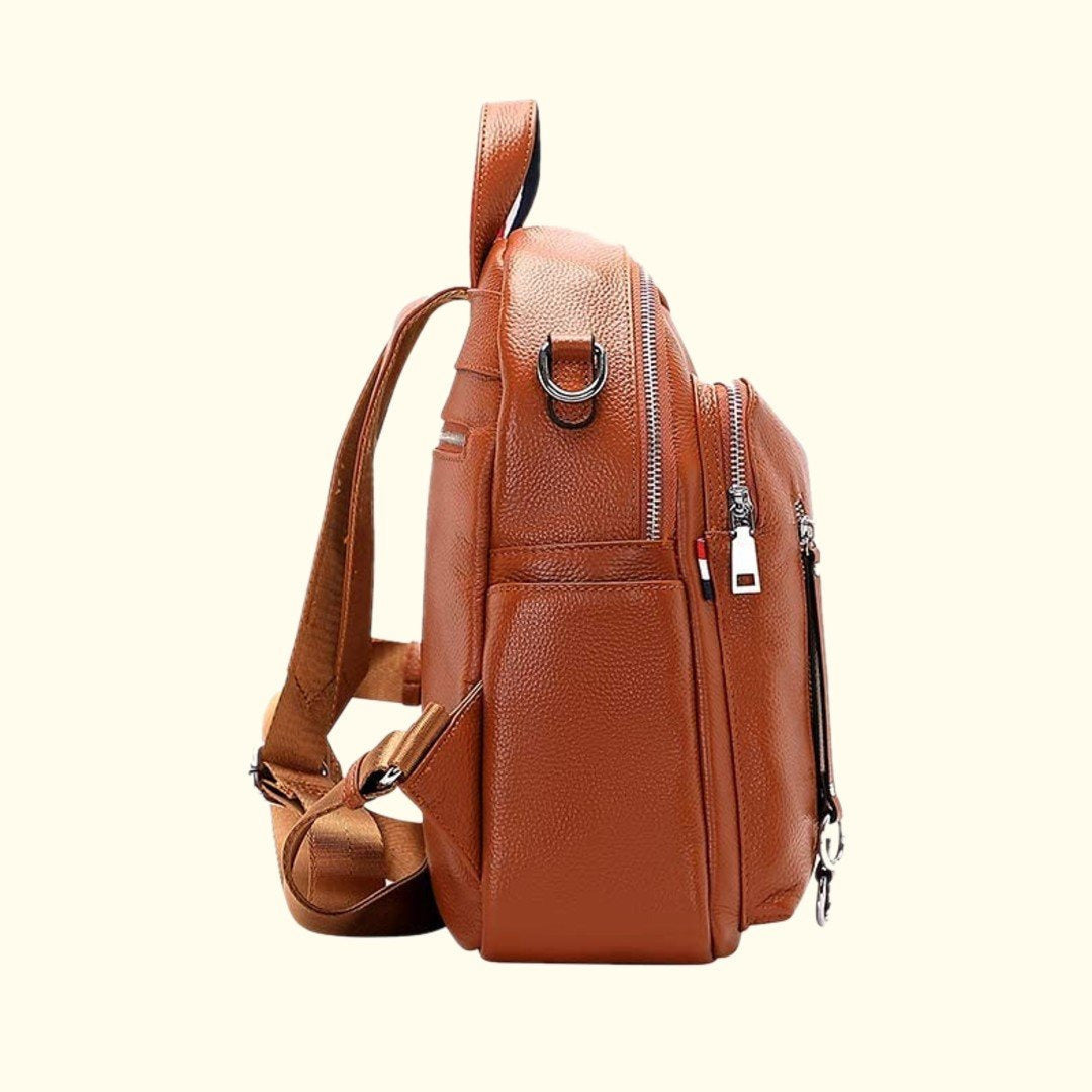Brown leather backpack on a white background