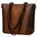 Brown leather tote bag on a white background